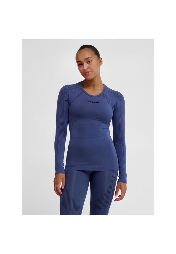 Damska koszulka bezszwowa z długim rękawem Hummel Shaping. Kolor: niebieski. Długość rękawa: długi rękaw. Długość: długie. Sport: joga i pilates, fitness