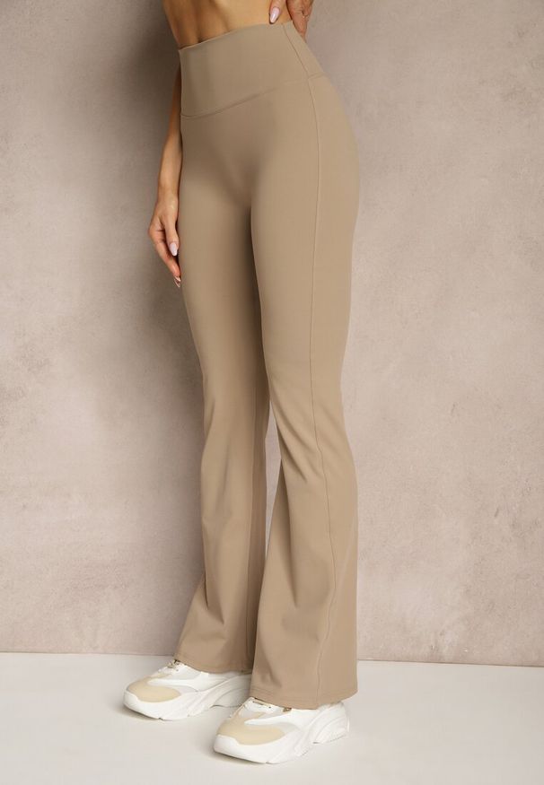 Renee - Beżowe Legginsy Dzwony High Waist Orruvana. Okazja: na co dzień. Stan: podwyższony. Kolor: beżowy. Styl: casual