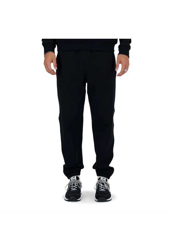 Spodnie New Balance MP41508BK - czarne. Kolor: czarny. Materiał: bawełna, dresówka, tkanina
