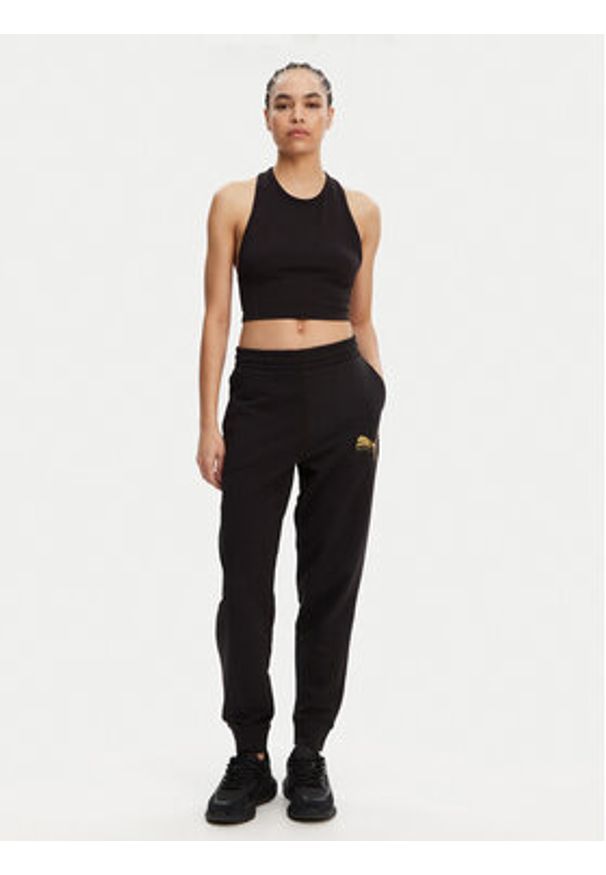 Puma Spodnie dresowe Ess Metallic 684999 Czarny Regular Fit. Kolor: czarny. Materiał: bawełna