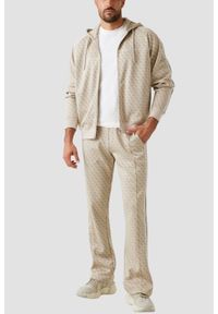 Guess - GUESS Beżowe męskie spodnie dresowe z lampasami w zielony monogram Parimo 4G, Rozmiar XXL. Kolor: beżowy. Materiał: dresówka #4