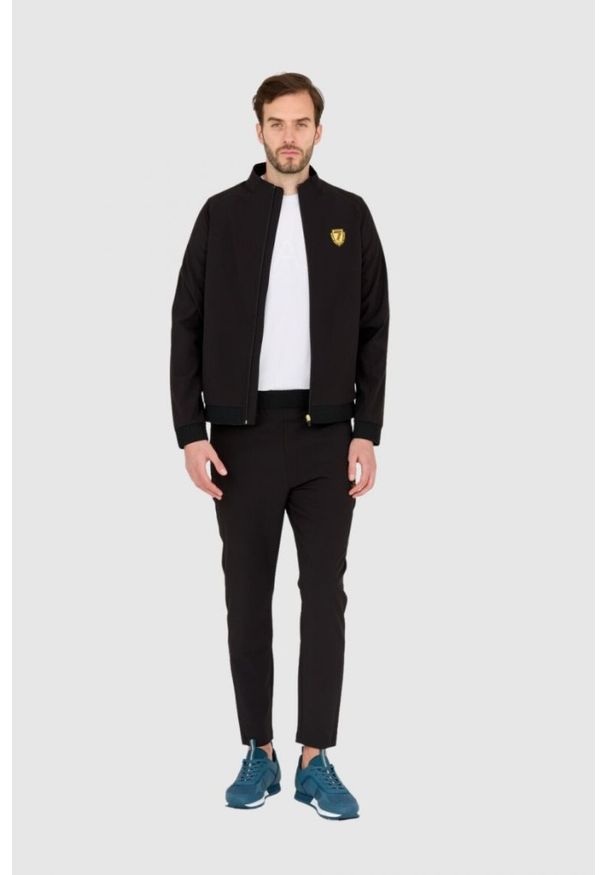 EA7 Emporio Armani - EA7 Dres czarny. Kolor: czarny. Materiał: dresówka. Wzór: aplikacja