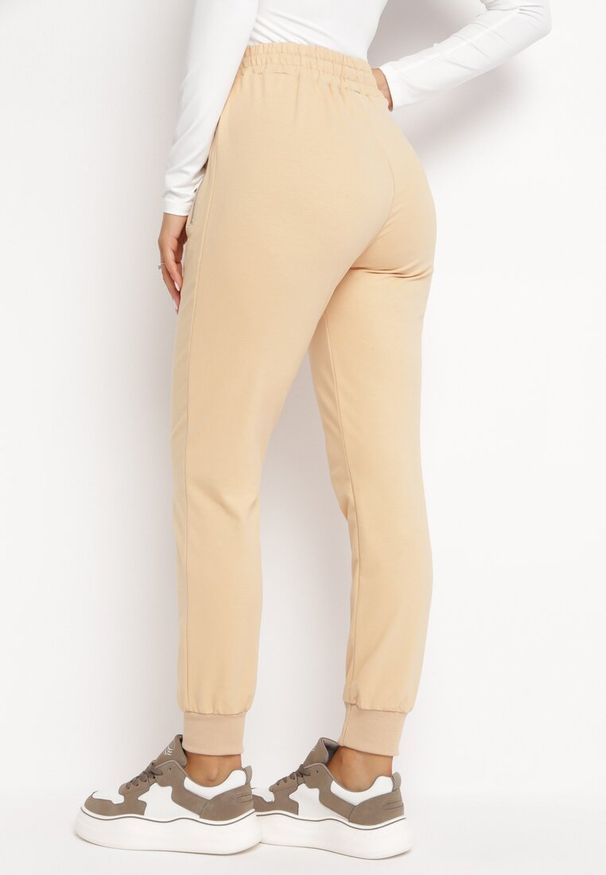 Born2be - Jasnożółte Bawełniane Spodnie Dresowe Joggery z Zasuwanymi Kieszeniami Ficacion. Kolor: żółty. Materiał: dresówka, bawełna