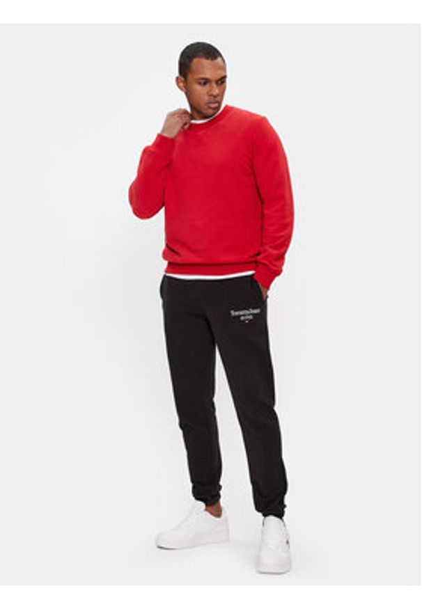 Tommy Jeans Spodnie dresowe Entry DM0DM18935 Czarny Slim Fit. Kolor: czarny. Materiał: bawełna