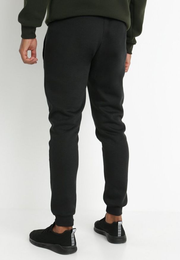 Born2be - Czarne Spodnie Argothoe. Okazja: na co dzień. Kolor: czarny. Materiał: dresówka, dzianina. Długość: długie. Wzór: gładki, jednolity. Styl: casual, sportowy