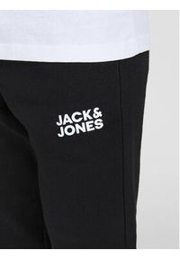Jack&Jones Junior Spodnie dresowe Gordon 12179798 Czarny Regular Fit. Kolor: czarny. Materiał: bawełna, syntetyk
