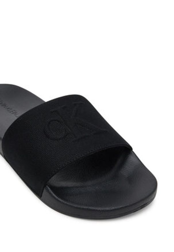 Calvin Klein Jeans Klapki Slide Hf Mono Cv YM0YM01282 Czarny. Kolor: czarny. Materiał: materiał