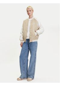 Tommy Jeans Kurtka bomber Souvenir DW0DW21432 Beżowy. Kolor: beżowy. Materiał: syntetyk