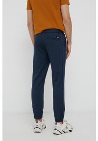 Calvin Klein Spodnie męskie kolor granatowy z nadrukiem. Kolor: niebieski. Wzór: nadruk #5