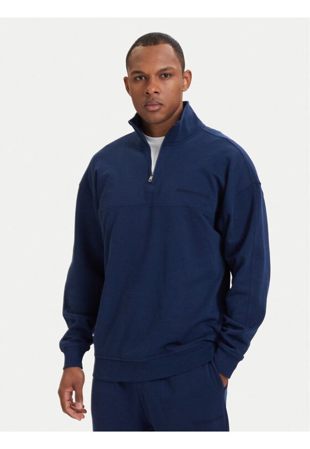 TOMMY HILFIGER - Tommy Hilfiger Bluza Essential UM0UM03909 Granatowy Regular Fit. Kolor: niebieski. Materiał: bawełna