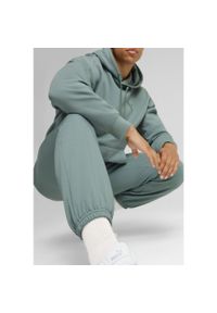 Puma - Spodnie dresowe unisex Essentials Elevated PUMA Green Moon. Kolor: zielony. Materiał: dresówka