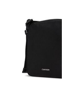 Calvin Klein Saszetka Ck Ease Reporter S K50K512886 Czarny. Kolor: czarny. Materiał: materiał