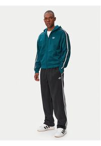 Adidas - adidas Spodnie dresowe adicolor Spacer KS7433 Czarny Baggy Fit. Kolor: czarny. Materiał: bawełna. Sport: turystyka piesza #5