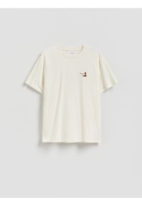 Reserved - T-shirt comfort z nadrukiem - złamana biel. Materiał: bawełna, dzianina. Wzór: nadruk