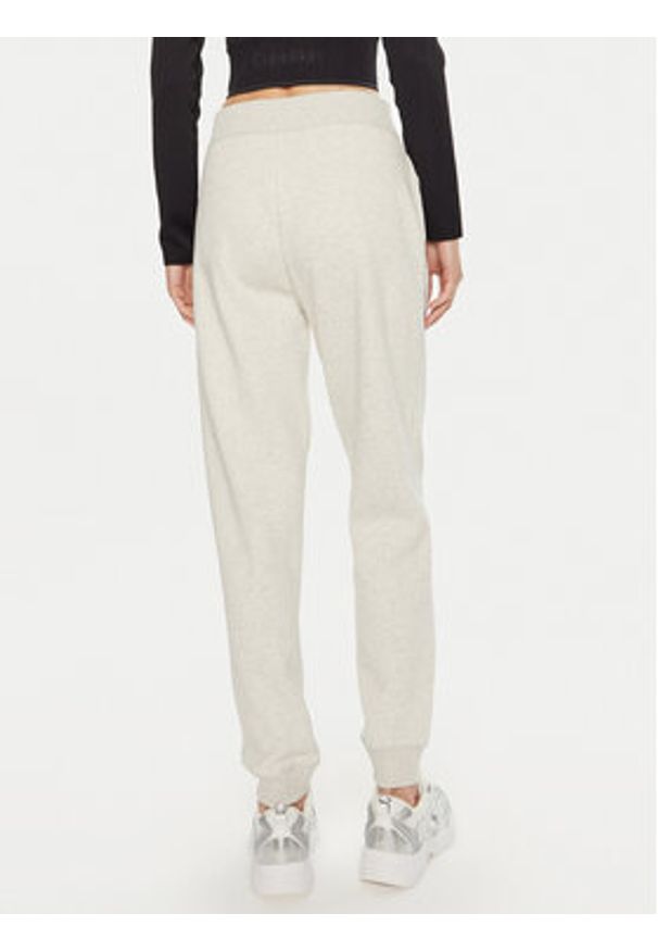 Calvin Klein Jeans Spodnie dresowe Monologo J20J223590 Szary Relaxed Fit. Kolor: szary. Materiał: bawełna, syntetyk