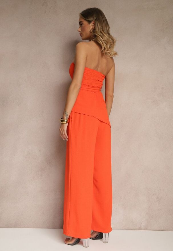 Renee - Pomarańczowy Komplet Spodnie o Szerokim Kroju i Asymetryczna Bluzka Ralinessa. Kolor: pomarańczowy. Wzór: aplikacja