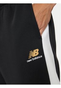 New Balance Spodnie dresowe MP43522BK Czarny Relaxed Fit. Kolor: czarny. Materiał: syntetyk #4