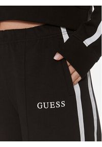 Guess Spodnie dresowe V4GB03 KC5R0 Czarny Relaxed Fit. Kolor: czarny. Materiał: bawełna, syntetyk