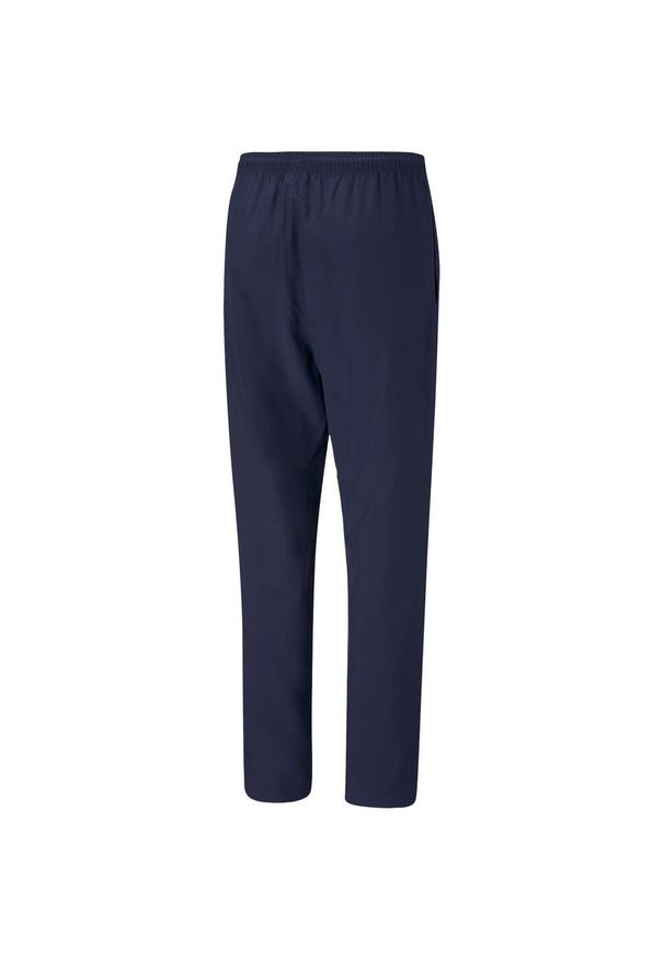 Spodnie męskie Puma teamRISE Sideline Pants. Kolor: niebieski, wielokolorowy, biały. Sport: piłka nożna