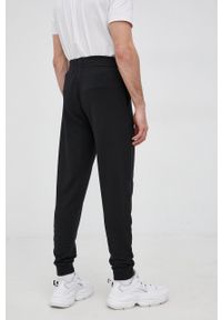 BOSS - Boss Spodnie męskie kolor czarny z nadrukiem. Kolor: czarny. Materiał: tkanina, jedwab, materiał, lyocell. Wzór: nadruk
