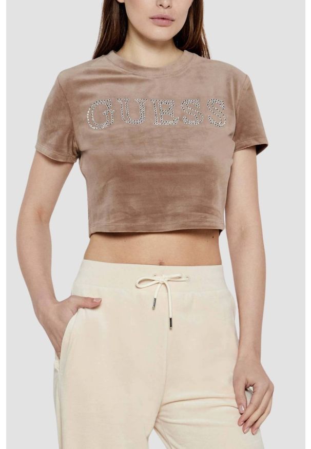 Guess - GUESS Brązowy damski top Couture Tee. Kolor: brązowy