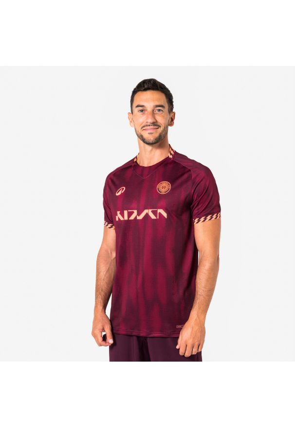 KIPSTA - Koszulka piłkarska krótki rękaw Kipsta Viralto II. Kolor: różowy, pomarańczowy, wielokolorowy, fioletowy. Materiał: tkanina, elastan, materiał, prążkowany, poliester. Długość rękawa: krótki rękaw. Długość: krótkie. Sport: piłka nożna