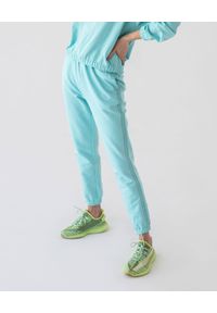 MARLU - Spodnie dresowe Jane. Kolor: niebieski. Materiał: dresówka #3