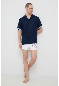 Calvin Klein szorty kąpielowe kolor biały. Kolor: biały. Materiał: tkanina, poliester, materiał. Wzór: nadruk #2