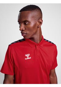 Koszulka sportowa Hummel Authentic Functional Polo. Typ kołnierza: polo. Kolor: czerwony, różowy, wielokolorowy. Styl: sportowy