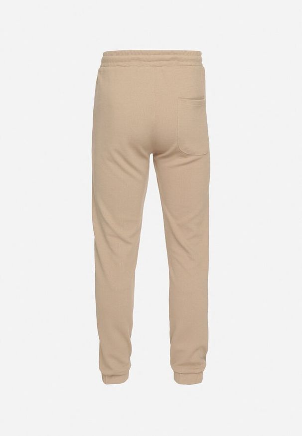 Born2be - Ciemnobeżowe Spodnie Dresowe z Bawełną i Sznurkami Arlania. Okazja: na co dzień, na spacer. Kolor: beżowy. Materiał: bawełna, dresówka. Styl: klasyczny, casual