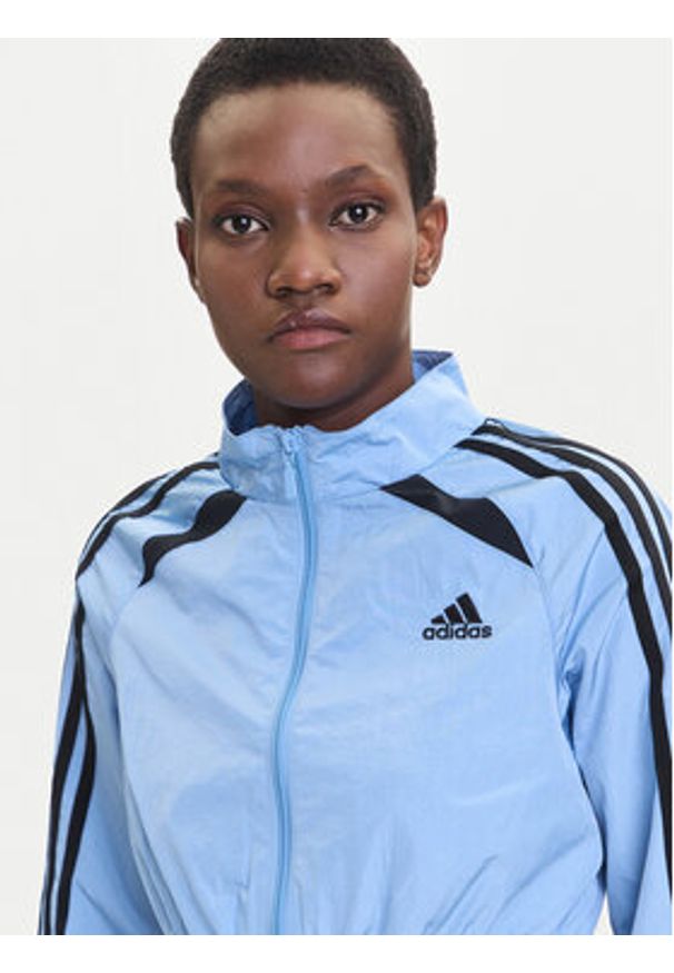 Adidas - adidas Bluza Teamgeist adicolor JZ8277 Błękitny Slim Fit. Kolor: niebieski. Materiał: syntetyk