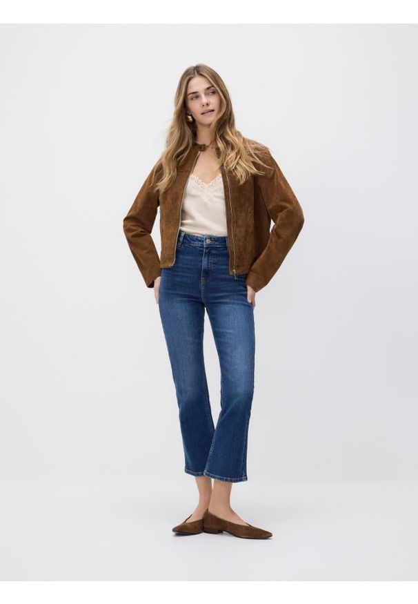 Reserved - Jeansy flare - niebieski. Kolor: niebieski