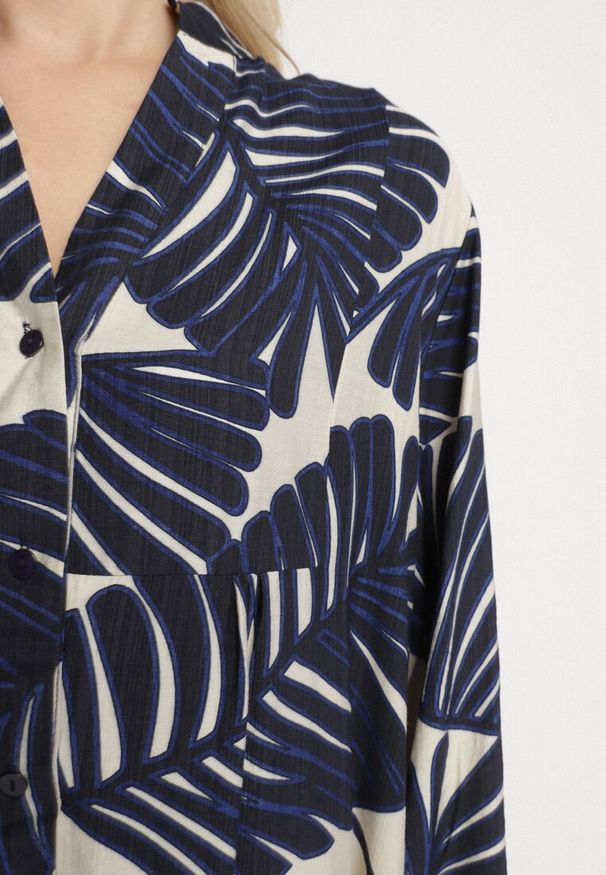 Born2be - Niebieska Wiskozowa Sukienka o Rozkloszowanym Kroju w Liście Rivvesa. Okazja: na co dzień, na spacer. Typ kołnierza: dekolt w kształcie V. Kolor: niebieski. Materiał: wiskoza. Typ sukienki: proste. Styl: elegancki, casual