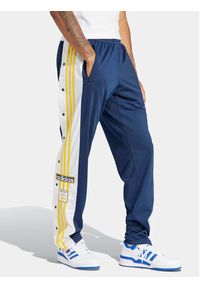 Adidas - adidas Spodnie dresowe adicolor Classics Adibreak IM8223 Granatowy Regular Fit. Kolor: niebieski. Materiał: syntetyk #4