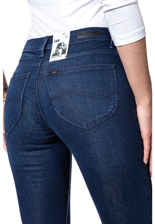 Lee - SPODNIE DAMSKIE LEE SCARLETT HIGH VQ L626RIVQ 112114334. Stan: podwyższony