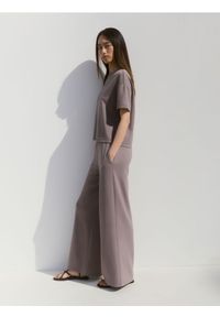 Reserved - Dresowe spodnie z modalem - beżowy. Kolor: beżowy. Materiał: dresówka #1