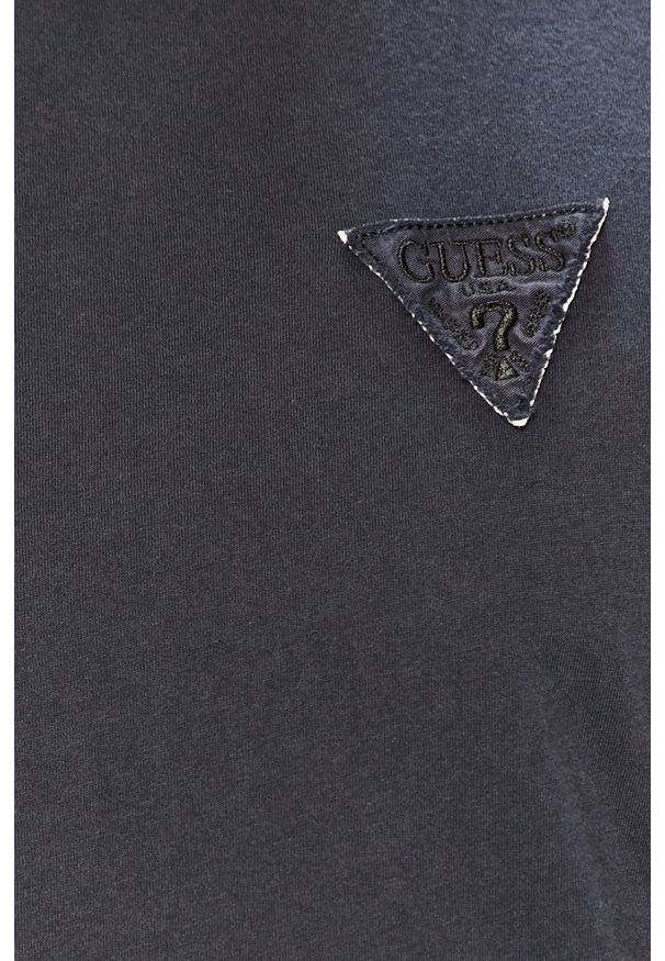 Guess - T-shirt. Okazja: na co dzień. Kolor: niebieski. Materiał: bawełna, dzianina. Wzór: gładki. Styl: casual