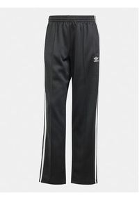 Adidas - adidas Spodnie dresowe adicolor Classics SST IS4102 Czarny Loose Fit. Kolor: czarny. Materiał: bawełna #2