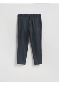 Reserved - Spodnie chino slim fit - granatowy. Kolor: niebieski. Materiał: bawełna, tkanina