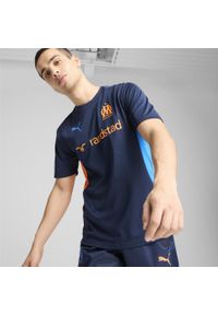 Puma - Męska koszulka treningowa Olympique Marsylia PUMA. Kolor: pomarańczowy, niebieski, wielokolorowy, żółty. Sport: piłka nożna