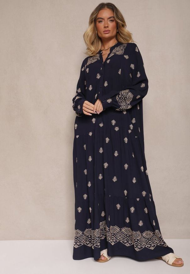Renee - Niebieska Rozkloszowana Sukienka Ozdobiona Haftem i Wzorem Boho Ronavere. Okazja: na co dzień, na spacer. Typ kołnierza: dekolt w serek. Kolor: niebieski. Długość rękawa: długi rękaw. Wzór: aplikacja, haft. Sezon: lato, wiosna. Typ sukienki: proste. Styl: boho