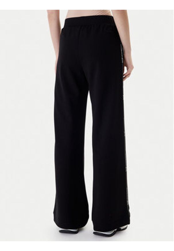 EA7 Emporio Armani Spodnie dresowe 7W000961 AF12501 UC001 Czarny Flared Fit. Kolor: czarny. Materiał: syntetyk