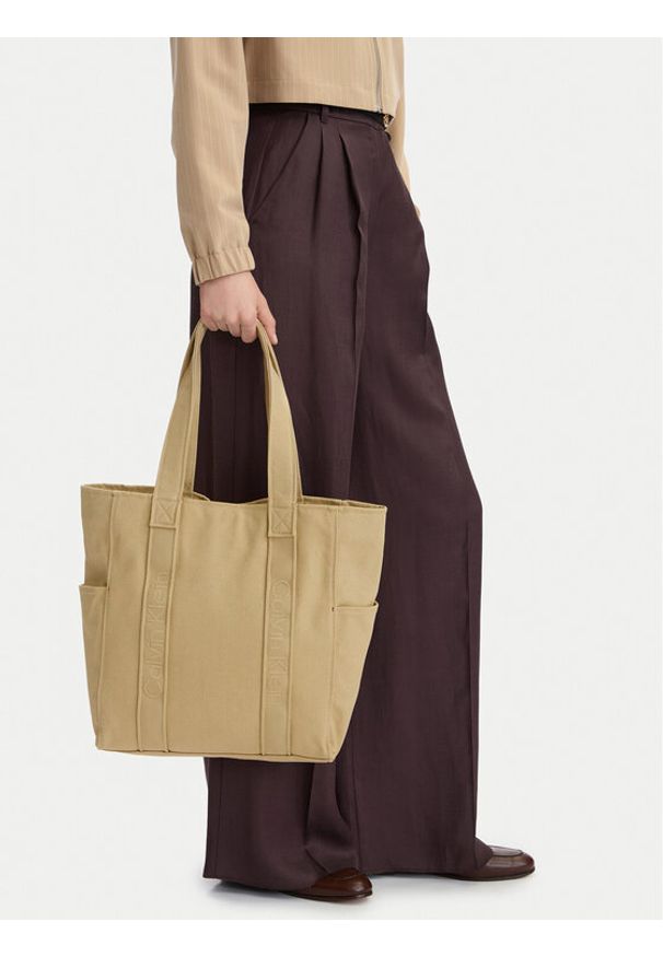 Calvin Klein Torebka Webbing Strap Canvas Tote LV04F3463G Beżowy. Kolor: beżowy