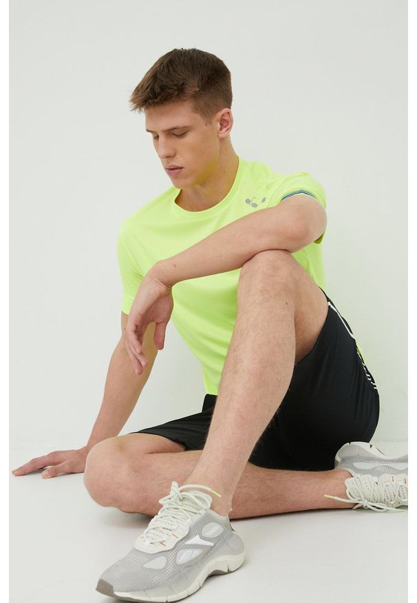 Diadora t-shirt do biegania kolor żółty gładki. Kolor: żółty. Wzór: gładki