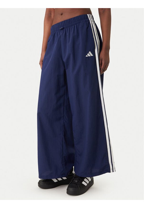 Adidas - adidas Spodnie dresowe Essentials 3-Stripes JV5328 Granatowy Loose Fit. Kolor: niebieski. Materiał: syntetyk