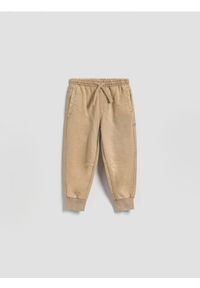 Reserved - Bawełniane joggery - beżowy. Kolor: beżowy. Materiał: bawełna #1