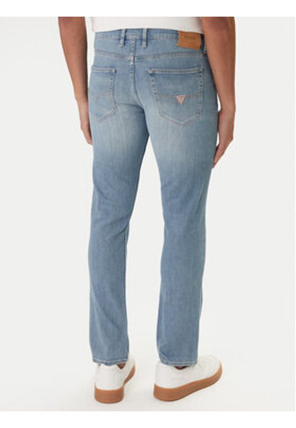 Guess Jeansy M6RAS2 D6761 Niebieski Slim Tapered Fit. Kolor: niebieski