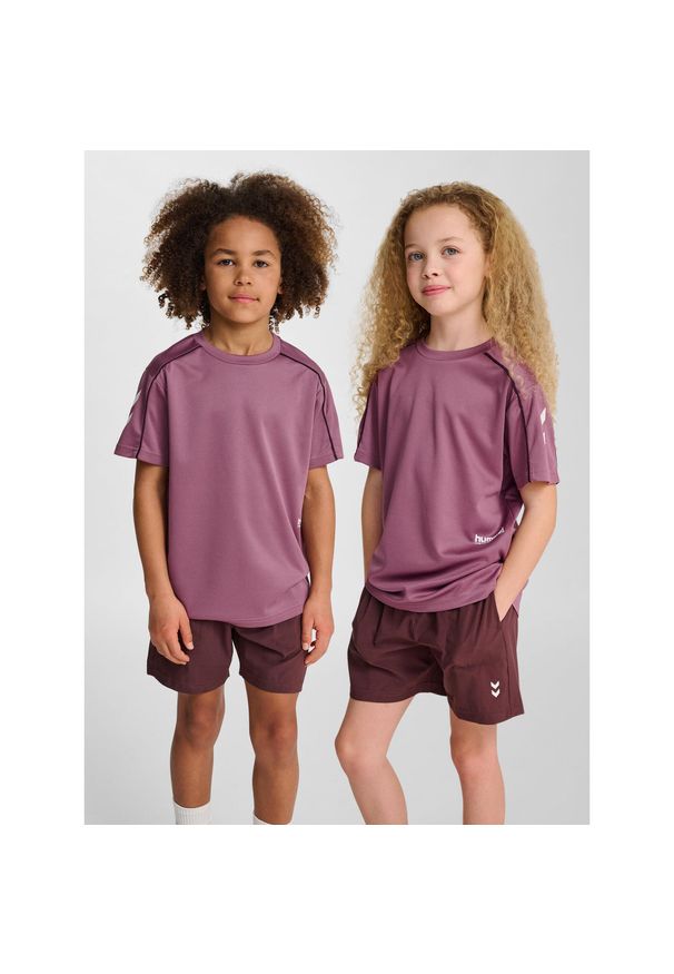 Koszulka dla dzieci Hummel. Kolor: fioletowy. Sport: joga i pilates