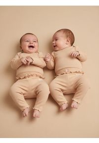 Sinsay - Prążkowane legginsy z falbanką 2 pack - różowy. Kolor: różowy. Materiał: prążkowany #1