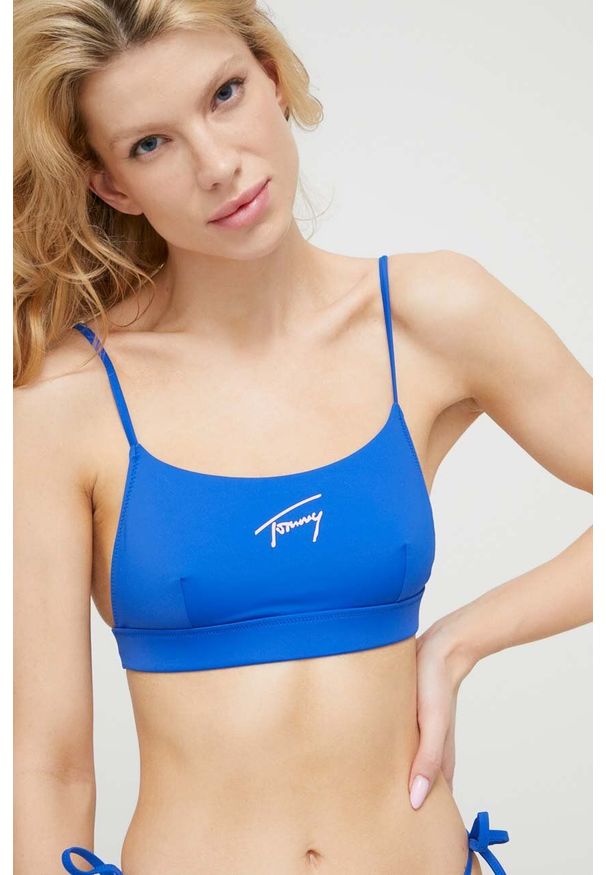 Tommy Jeans biustonosz kąpielowy kolor granatowy miękka miseczka. Kolor: niebieski. Materiał: materiał. Wzór: nadruk